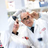 Laura H. Carnell Professor and Chair of the Department of Neuroscience Kamel Khalili, right, and a researcher, work in a lab at the Lewis Katz School of Medicine at Temple University.